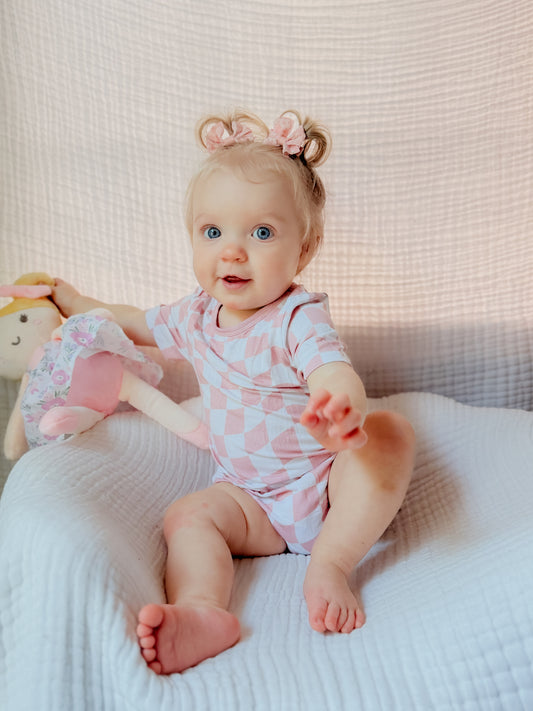Blush Trippy Checks Loose-fit Onesie